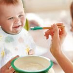 Disposable Sleeved Feeding Bib (6 Pcs) - Image 3